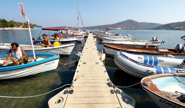 boats moored on a rotodock