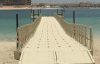 long dock on a dubai beach