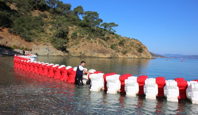 man with marine equipment in water