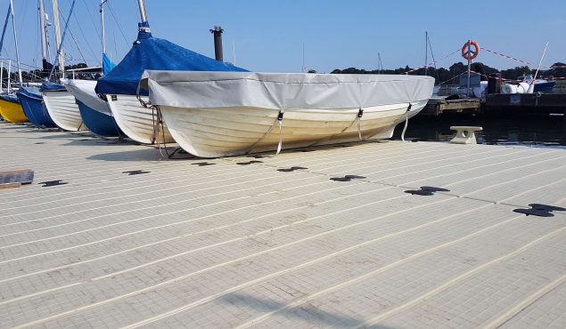 A large 27m x 4m Rotodock pontoon with staggered areas, cleats, corner gussets, and moorings. Fareham Sailing and Motor Boat Club, Hampshire.