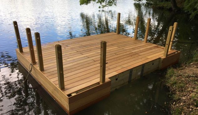 Installing a decked pontoon with handrails and mooring for a private customer, Cranleigh.