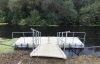 One of four 6m x 3m Rotodock pontoons with 4m gangway, handrails and land piles on the River Parrett in Langport, Somerset.