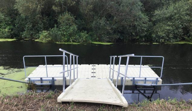 One of four 6m x 3m Rotodock pontoons with 4m gangway, handrails and land piles on the River Parrett in Langport, Somerset.