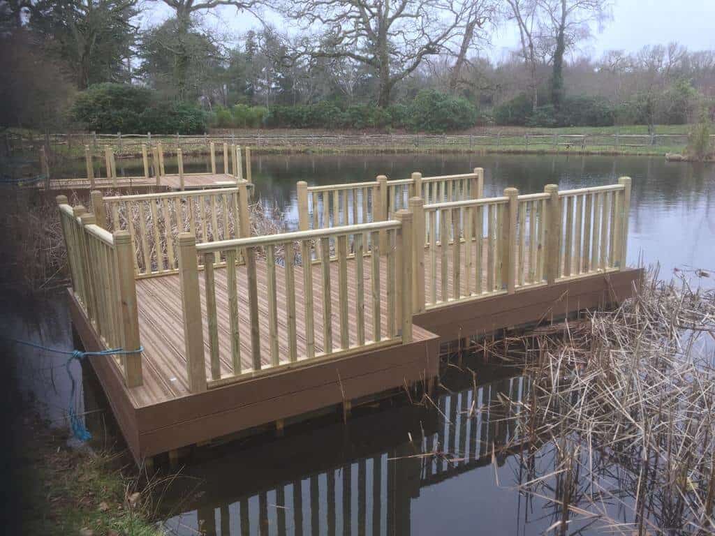 Decked Rotodock pontoon with bespoke spindle handrails