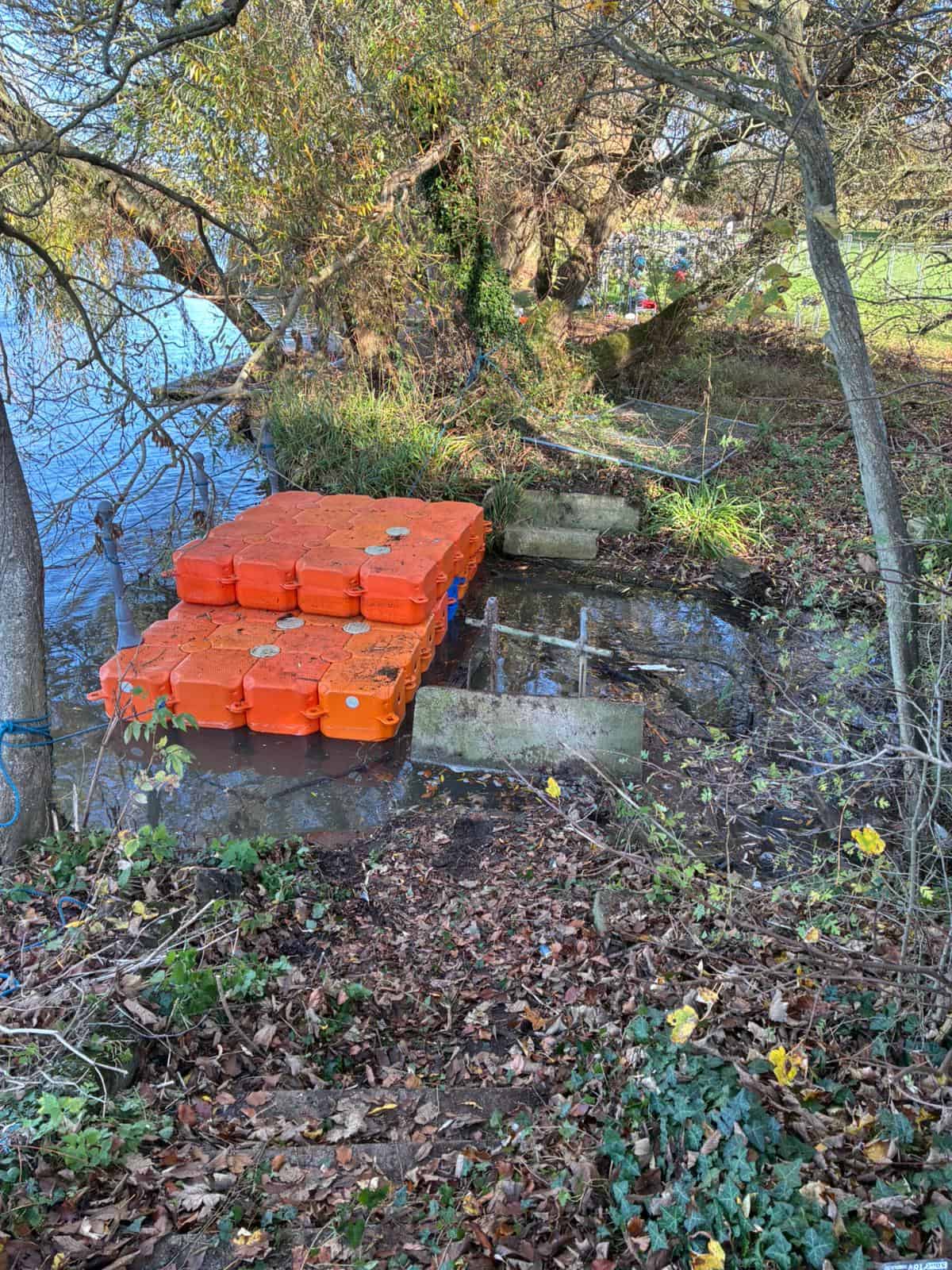 Bridge area after removal of old bridge. Modular Cube working platforms in the water to allow for bridge access